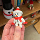 Oopsie Snowman Book Shelf Buddy