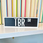 Oopsie Black TBR Sign
