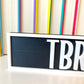 Oopsie Black TBR Sign